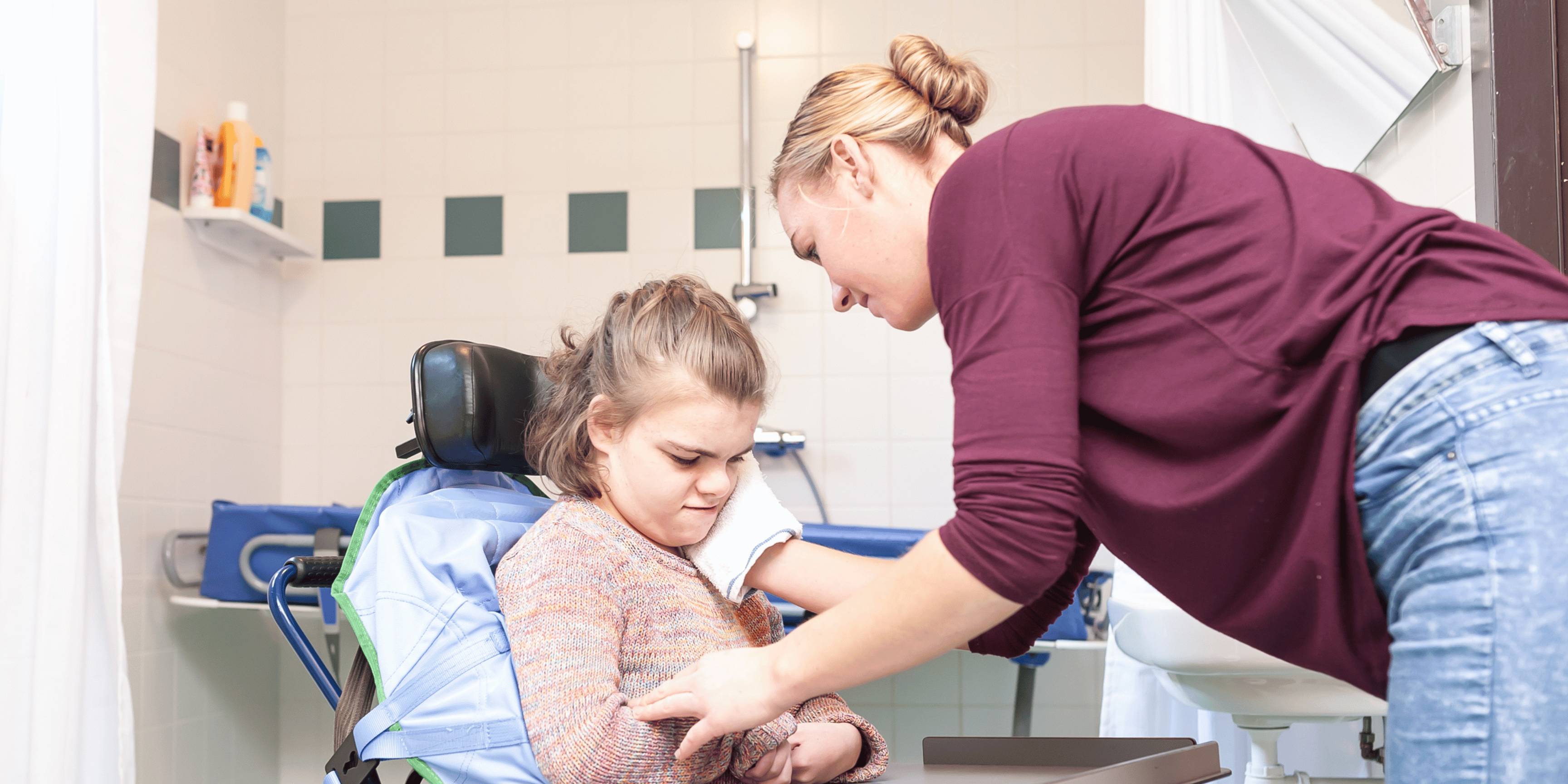Health professional assisting a patient with complex needs