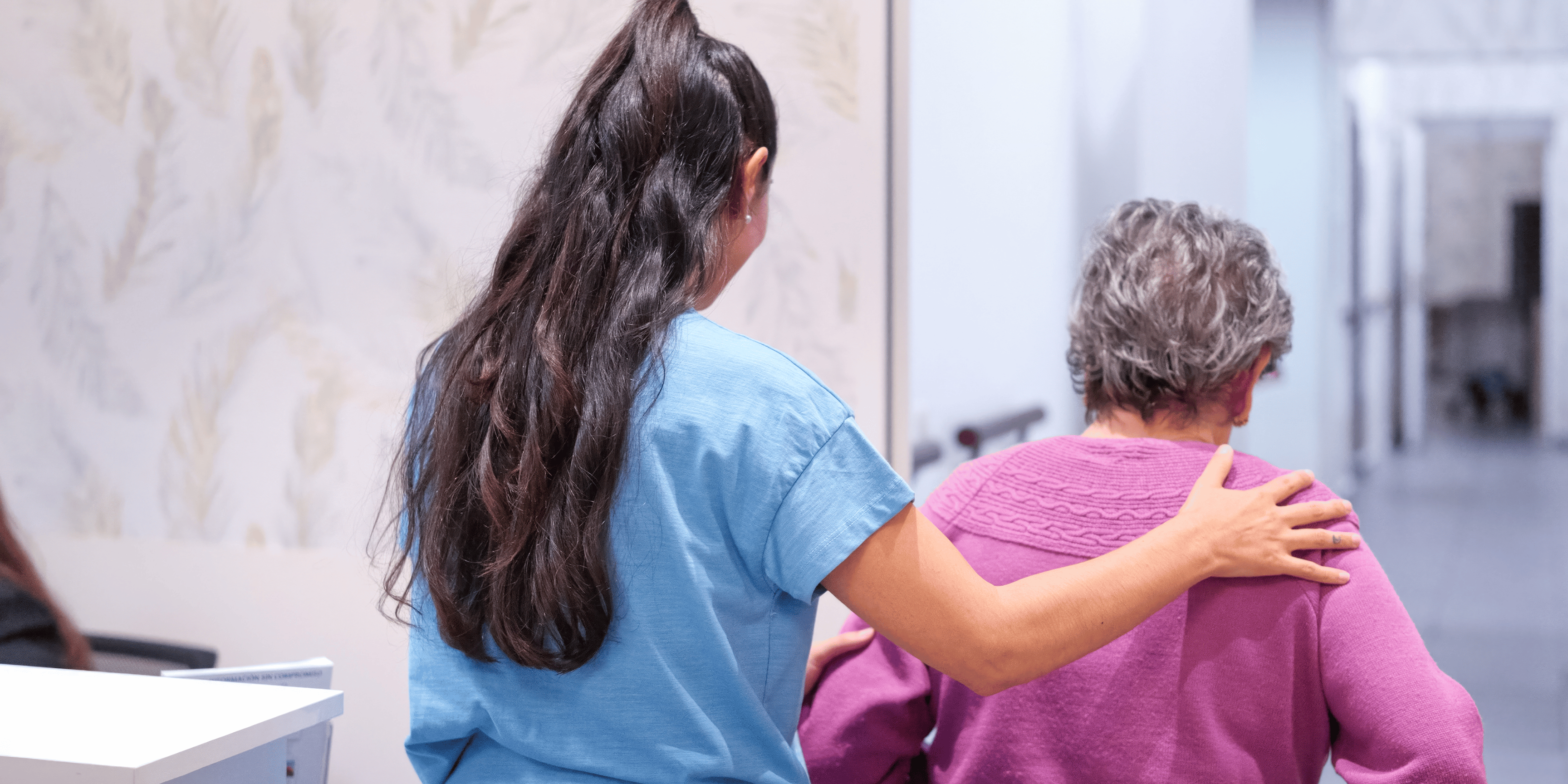 Health professional assisting client/patient with their mobility