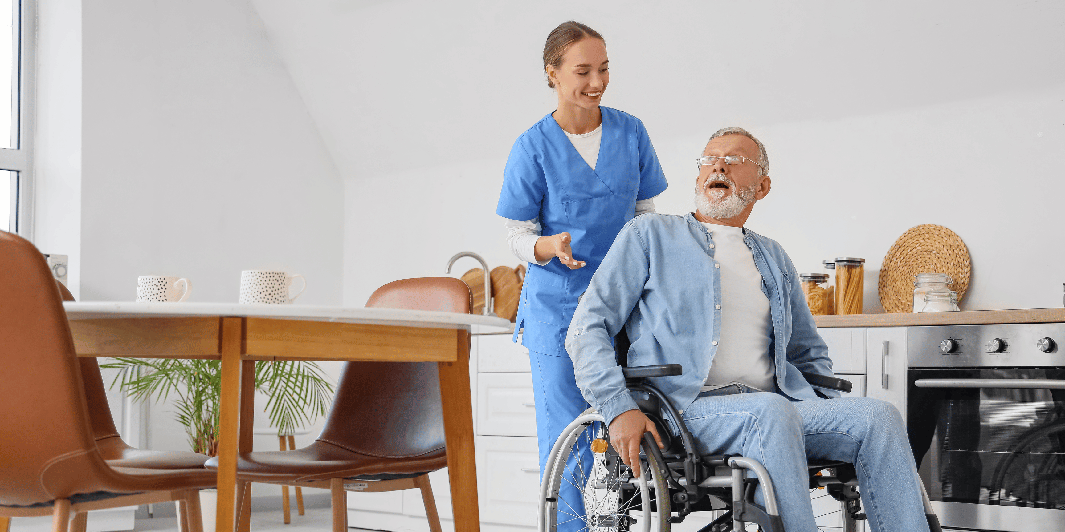 Homecare Nurse pushing older man in a wheelchair