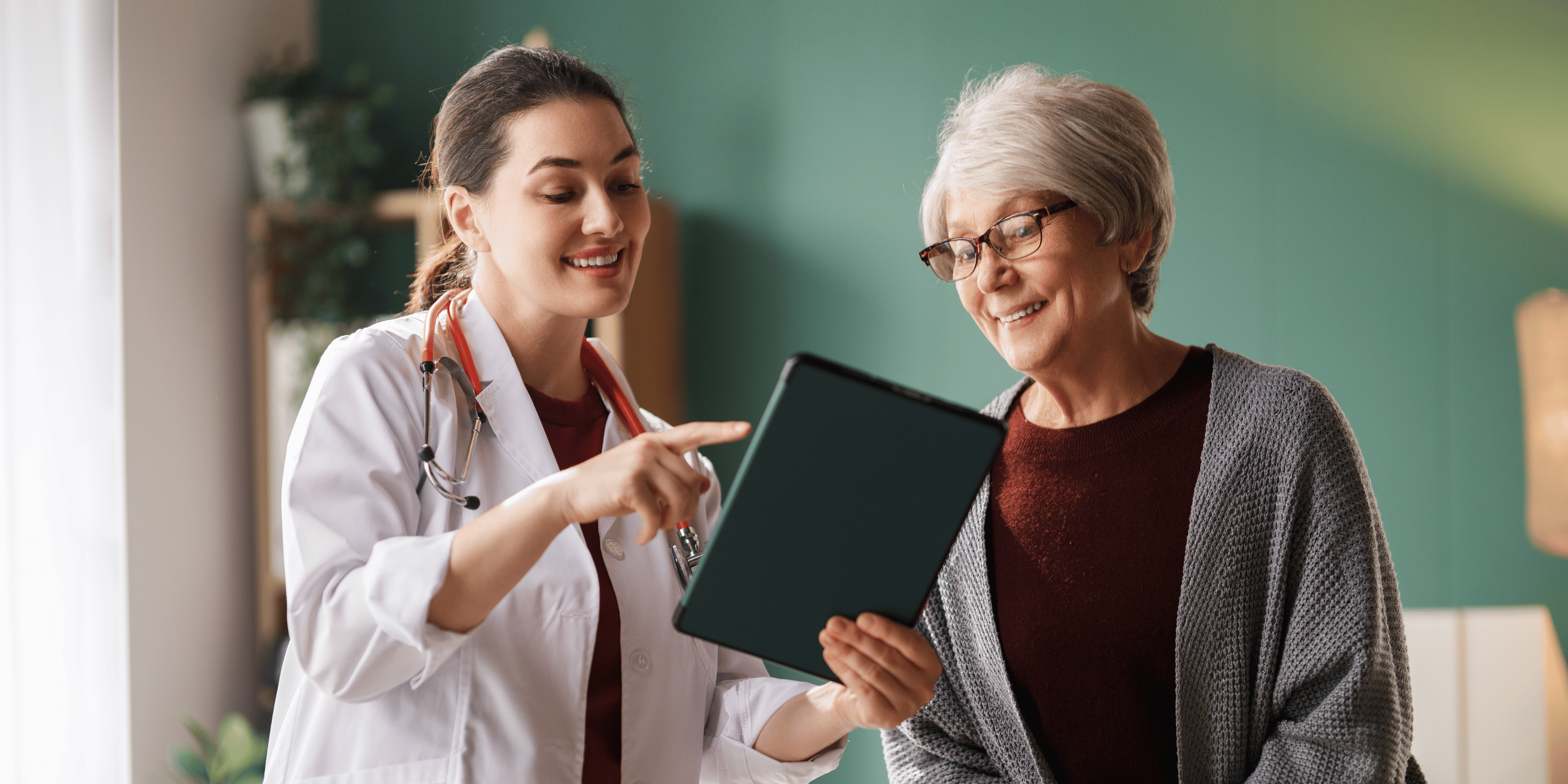 Patient and nurse going through medication requirements, and other important documents