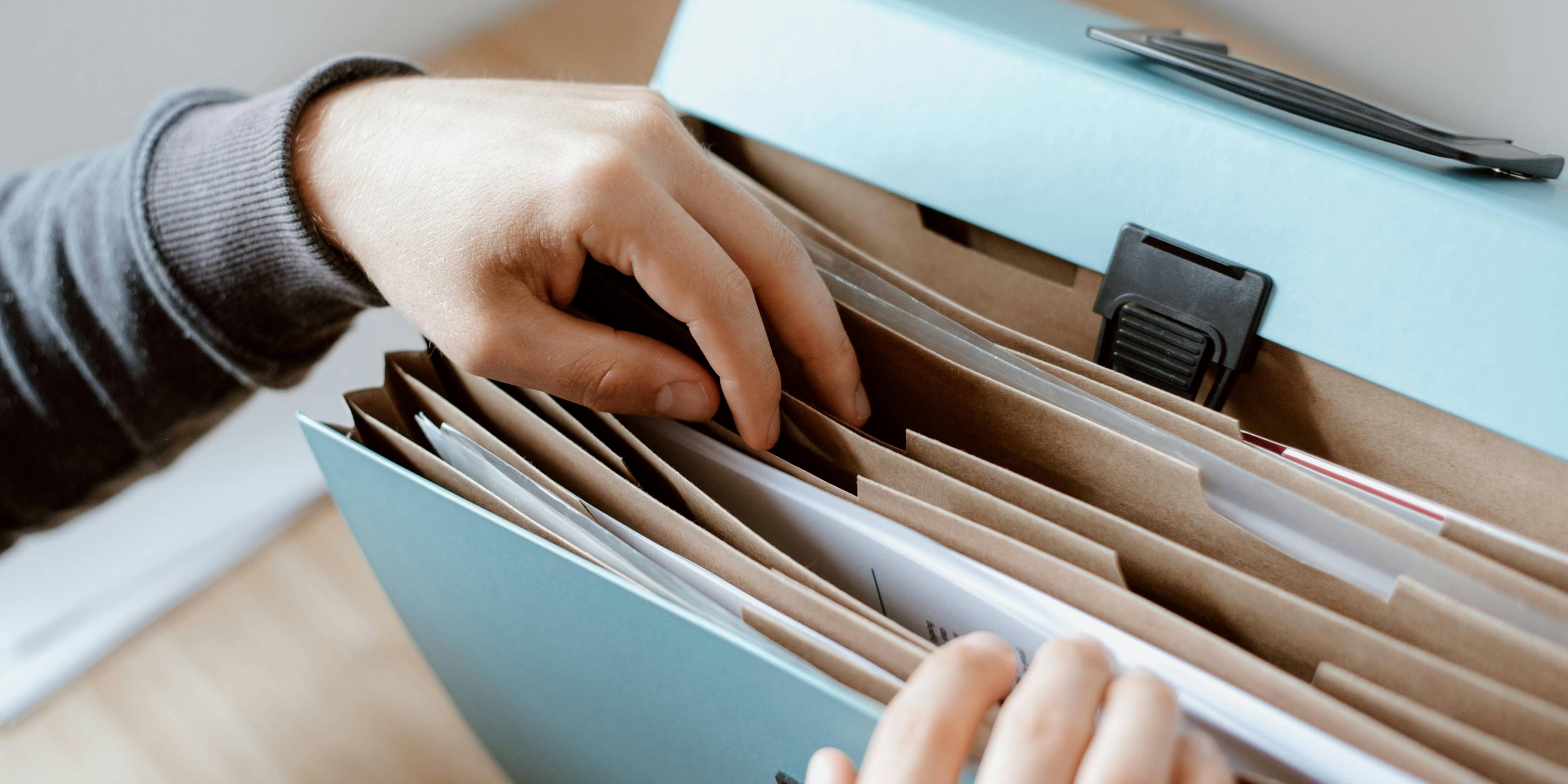 health professional going through compliance paperwork